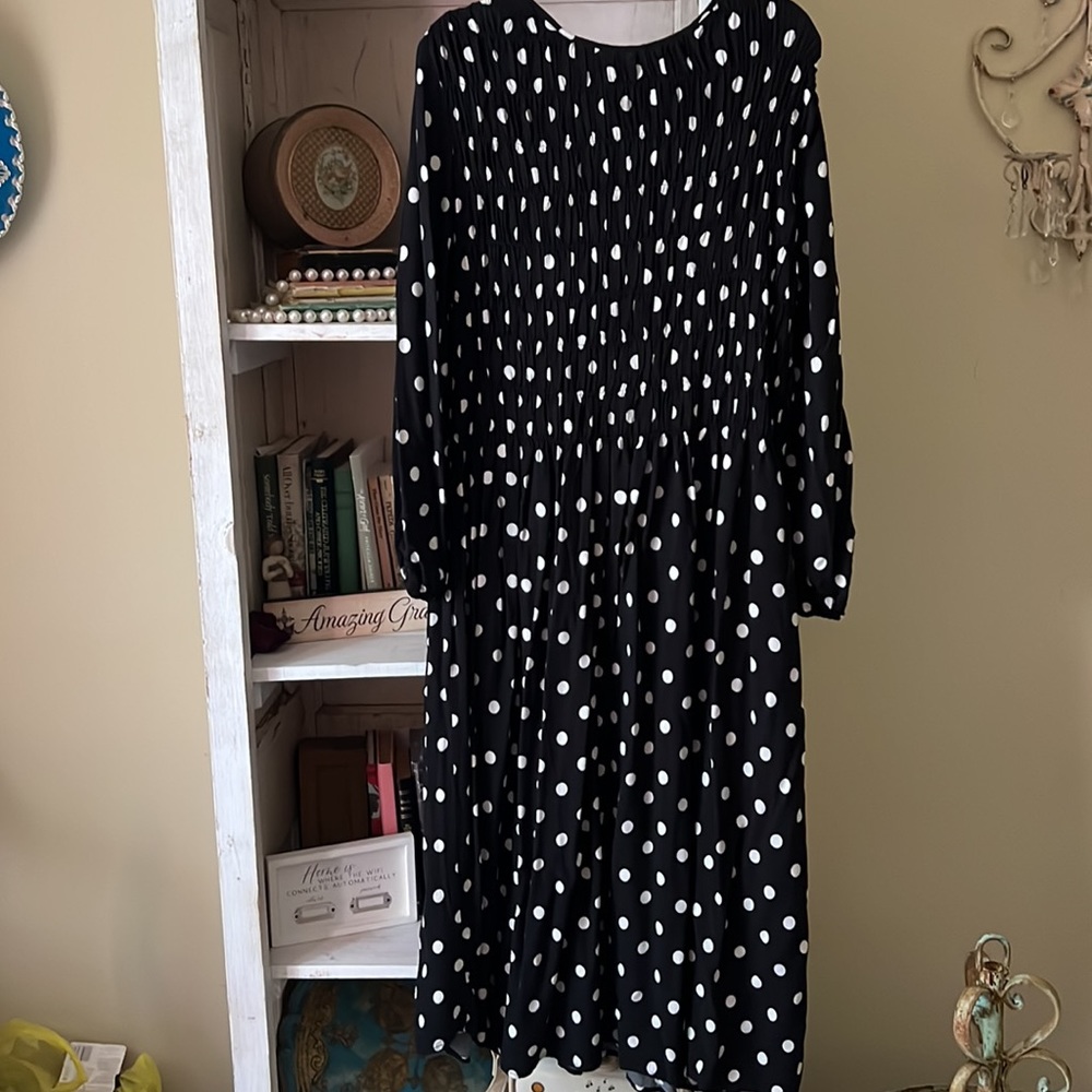 Long sleeve polka dot maxi dress with smocked bodice